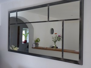 Comment fixer un miroir mural ?